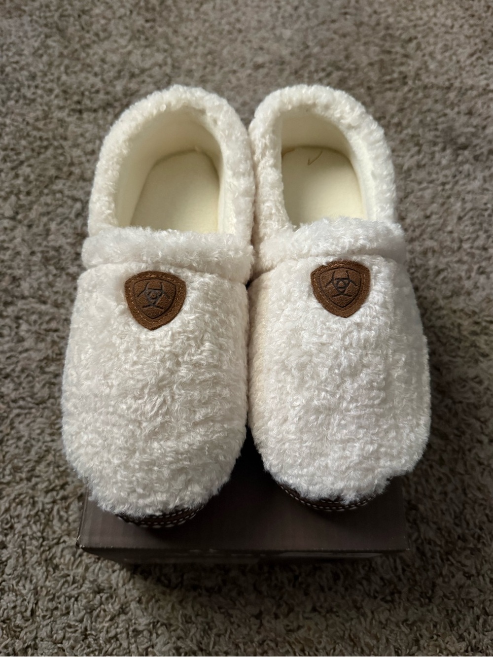 Ariat Cream Sherpa Cozy Slip-On Slippers with Brown Shield Accent